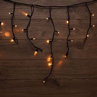 Гирлянда светодиодная "Айсикл" (бахрома) 5х0.7м 152LED тепл. бел. эффект мерцания провод черн. каучук | код 255-306 | Neon-Night
